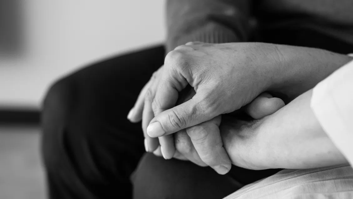 A person caring an other for their disease